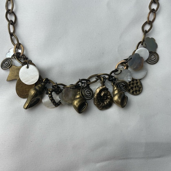 Women's Fashion Jewelry - Gold-toned Seashell Necklace with carved shells - Picture 2 of 4